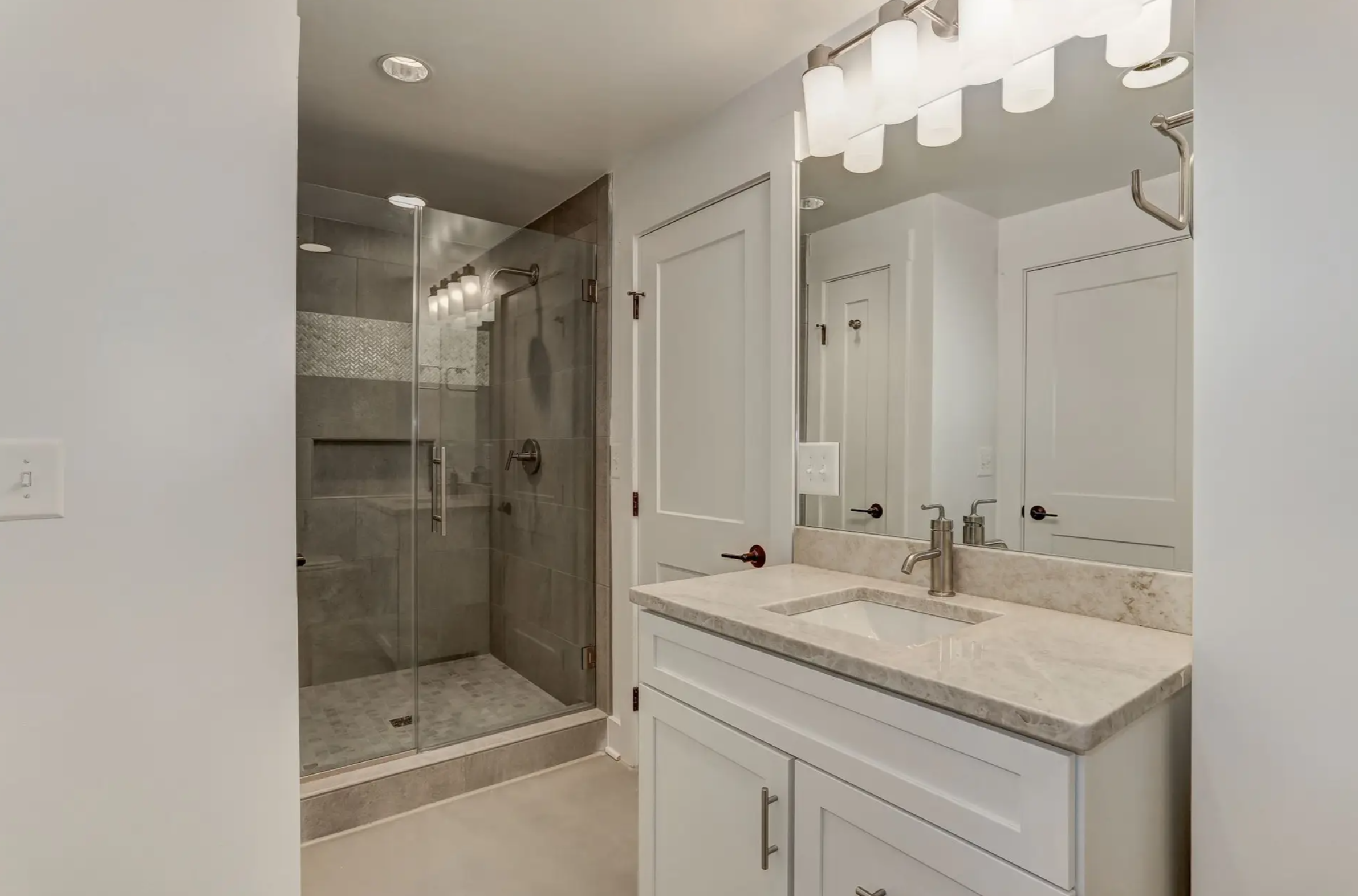 Lighting Ideas That Transform a Home inspiration. Modern whole-home remodel with refreshed exterior details