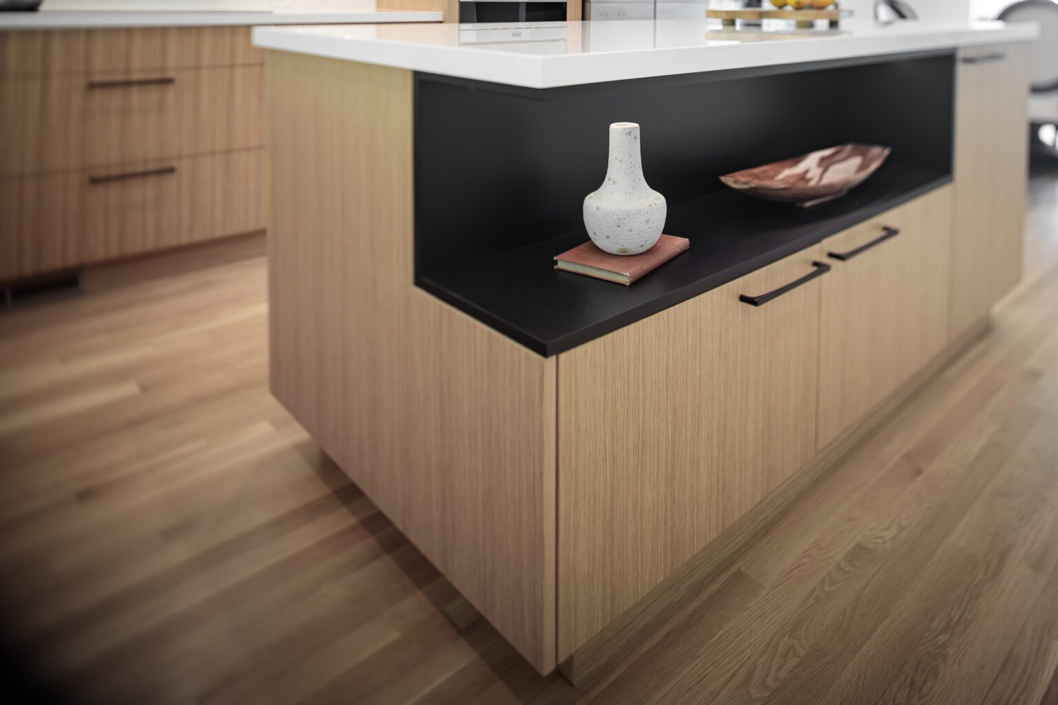 Quartz vs Granite Countertops inspiration. Modern oak kitchen island with black inset and quartz counters