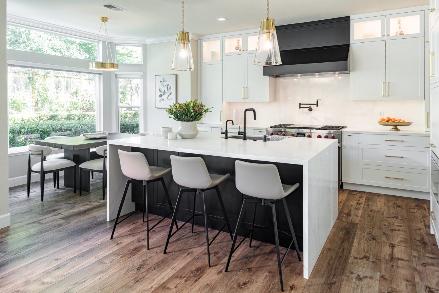 Best Countertop Materials for Busy Families inspiration. Two toned kitchen cabinets with quartz countertops