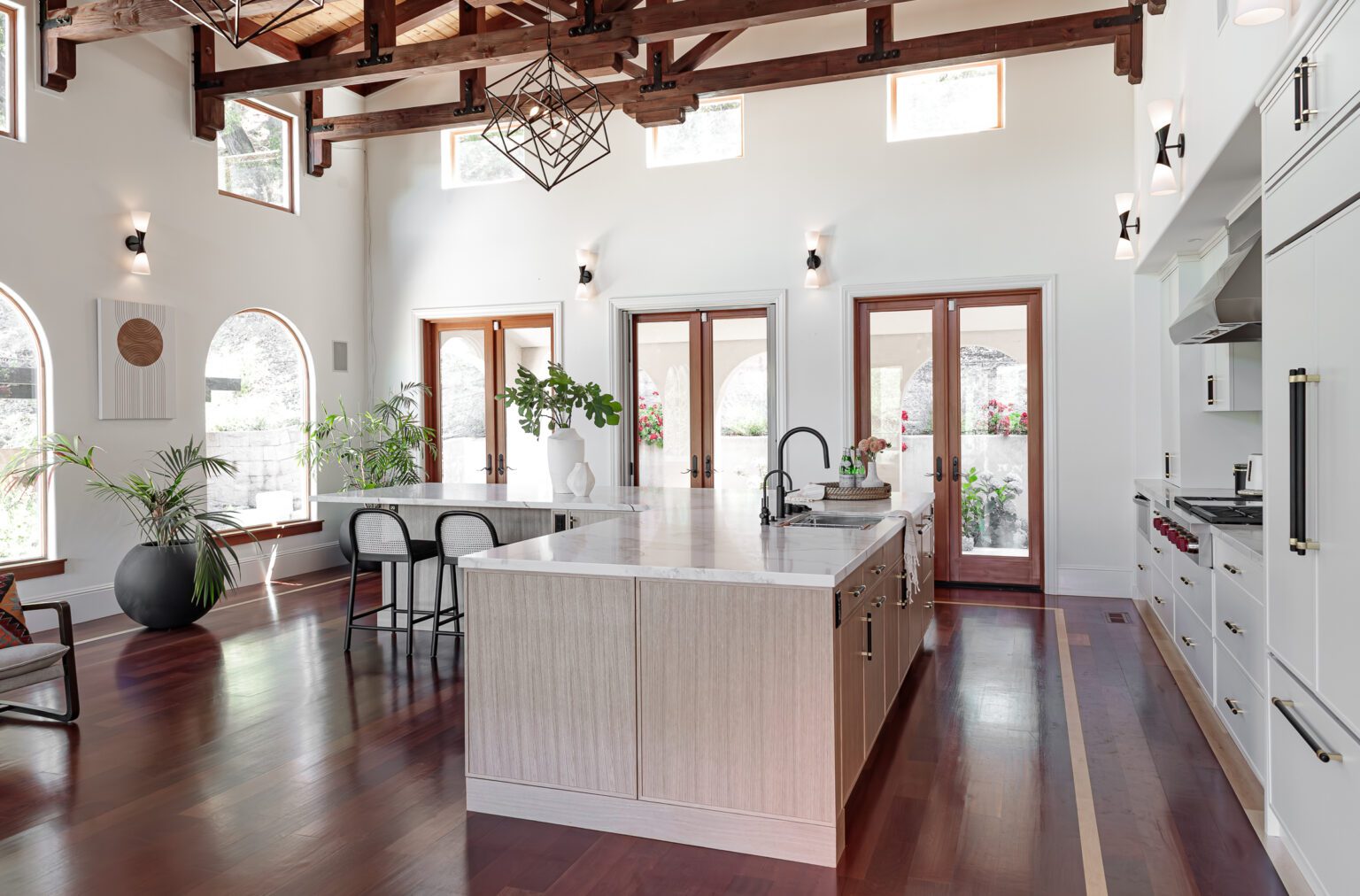 Cabinet Styles That Never Go Out of Style inspiration. Kitchen renovation with a large island and bright finishes